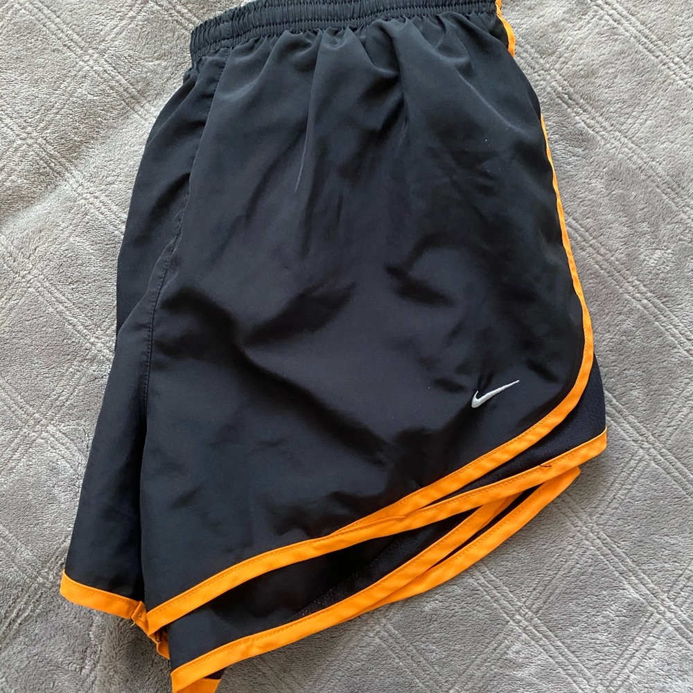 black and orange nike shorts